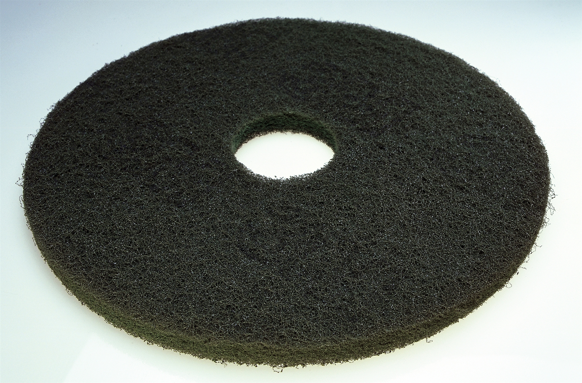 Eponge abrasive verte , tri couches pour récurer les surfaces