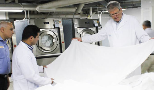 Guide du lavage du linge en blanchisserie